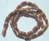 16 Inch Strand of 10x5mm Carved Sigid Tubes